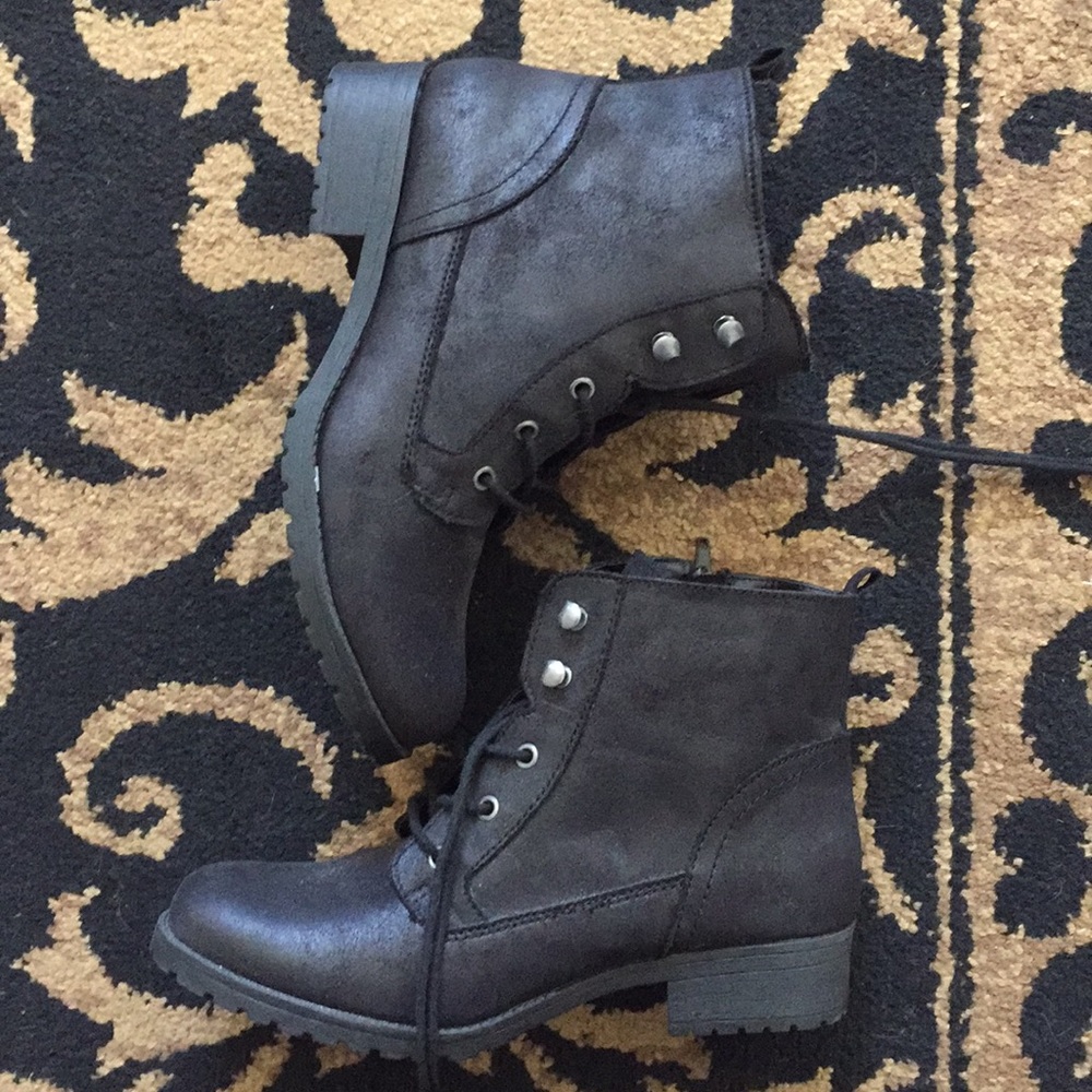 Black lace up boots.